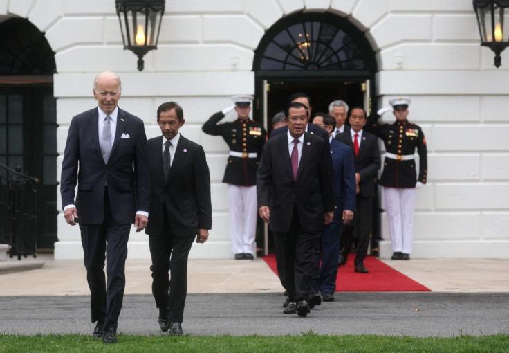 U.S. President Joe Biden walks onto the South Lawn with leaders from the Association of Southeast Asian Nations (ASEAN) to take a group photograph as Biden hosts a special U.S.-ASEAN summit at the White House in Washington, U.S., May 12, 2022.