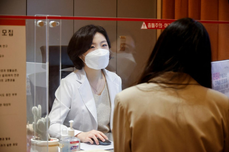 Kim Ji-hyun, a professor at Cha Fertility Center, checks a patient at the clinic, in Bundang, South Korea, April 30, 2022. Picture taken April 30, 2022.