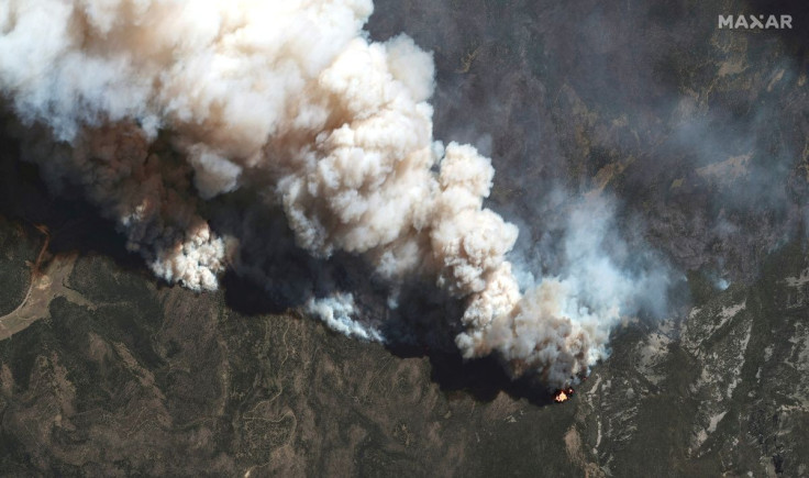 A satellite image shows a natural color view of active fire lines from the Hermits Peak and Calf Canyon fires, near Las Vegas, New Mexico, U.S., May 11, 2022. Picture taken May 11, 2022. Satellite image 2022 Maxar Technologies/Handout via REUTERS