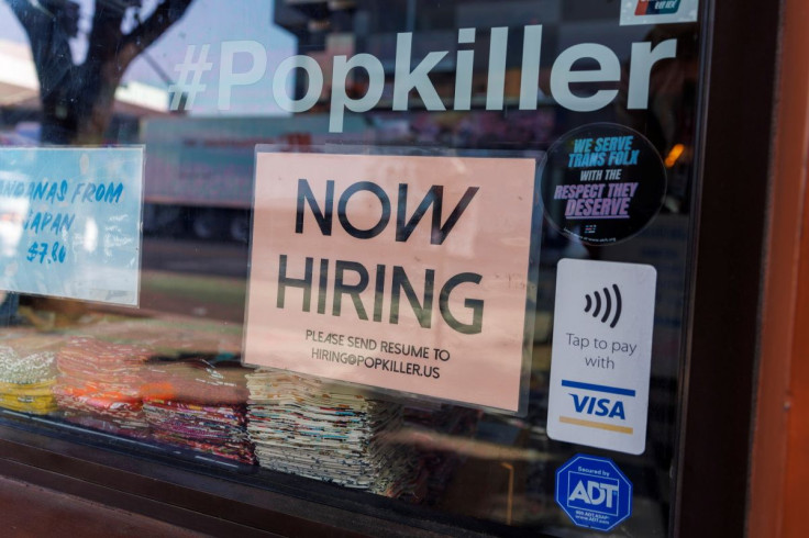 A store advertises for workers in downtown Los Angeles, California, U.S. November, 16, 2021.  