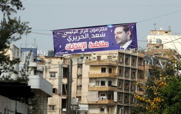 A banner bearing a picture of the Lebanese ex-prime minister reads: 'Committed to PM Saad Hariri's decision to boycott the elections'