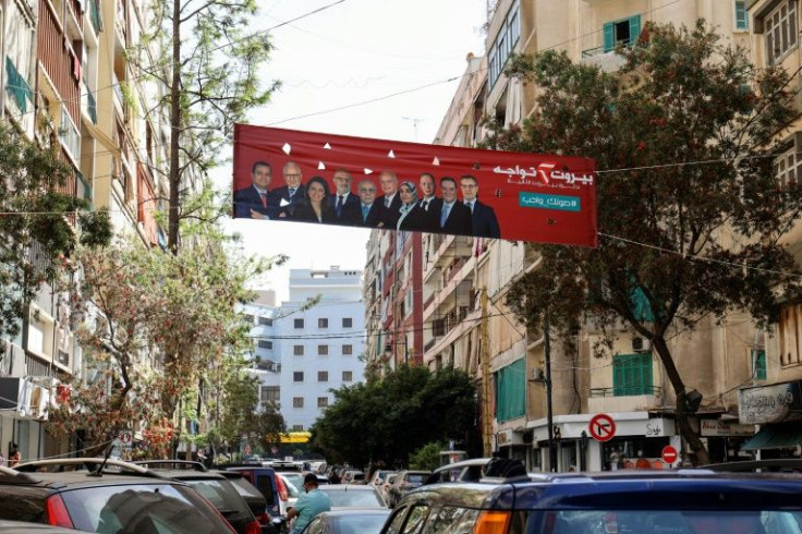 An election banner hangs between buildings in the Tariq al-Jdideh neighbourhood of the Lebanese capital Beirut