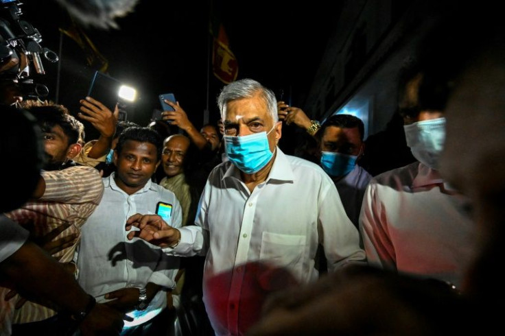 Ranil Wickremesinghe was sworn in as prime minister to navigate his country through the worst downturn in its history as an independent nation