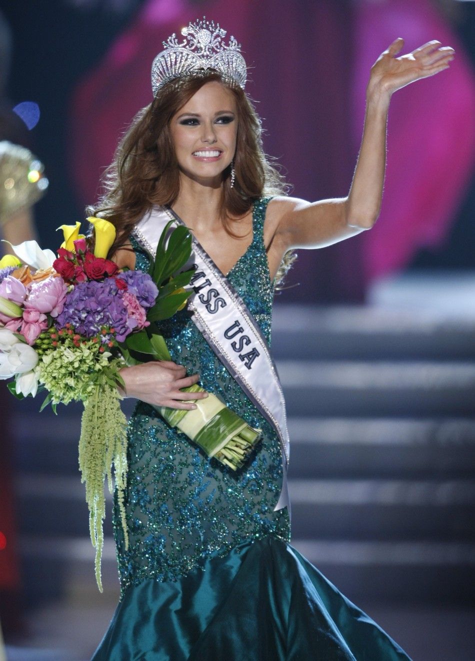 Miss California Alyssa Campanella waves after being crowned Miss USA 2011 during the Miss USA pageant in the Theatre for the Performing Arts at Planet Hollywood Hotel and Casino in Las Vegas, Nevada June 19, 2011. 