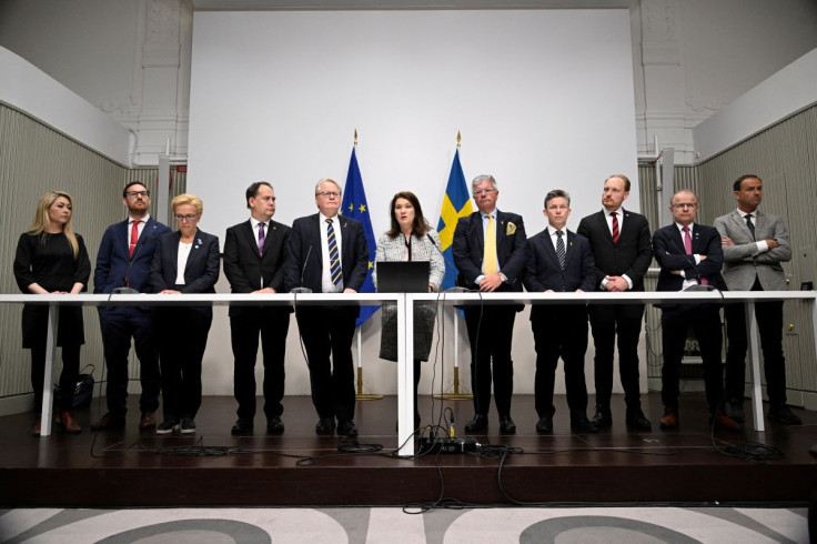 Sweden's Defense Minister Peter Hultqvist, Foreign Minister Ann Linde and and Sweden's security policy analysis group announce their report during a news conference in Stockholm, Sweden, May 13, 2022. TT News Agency/Henrik Montgomery via REUTERS    