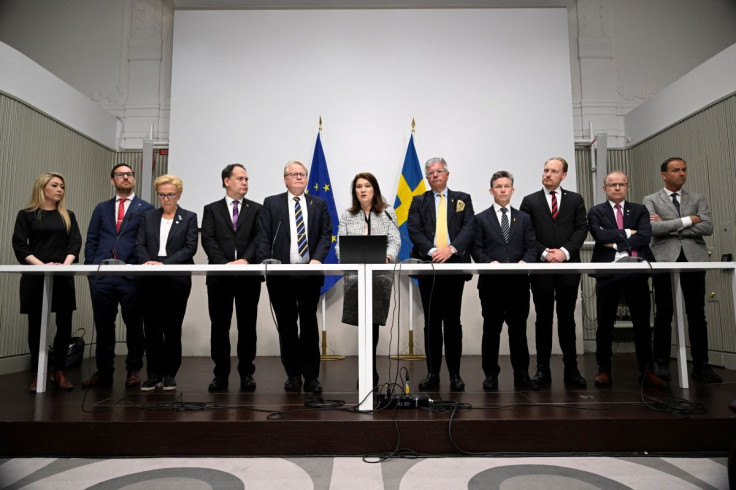 Sweden's Defense Minister Peter Hultqvist, Foreign Minister Ann Linde and and Sweden's security policy analysis group announce their report during a news conference in Stockholm, Sweden, May 13, 2022. TT News Agency/Henrik Montgomery via REUTERS