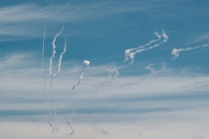 Vapour trails from missile fire illustrate the intensity of the long-range shooting war being waged in east Ukraine