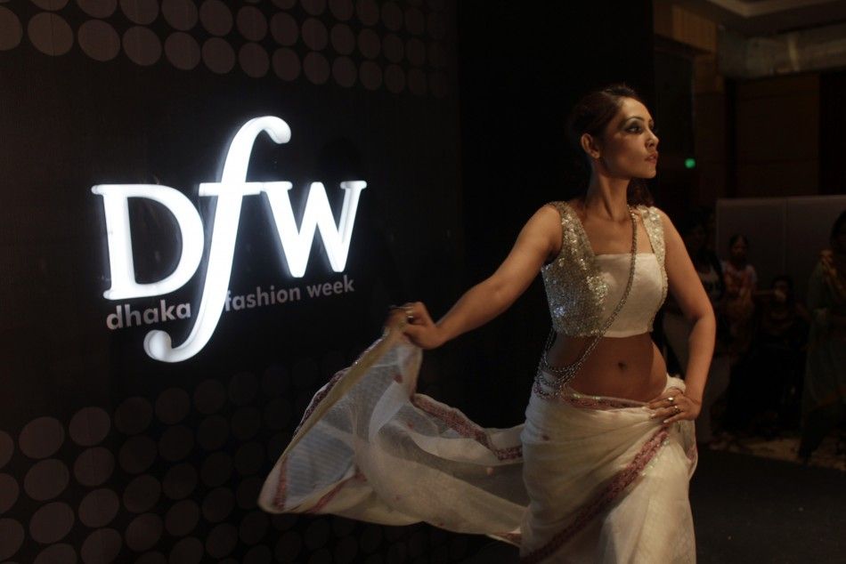 A model catwalks during Dhaka Fashion Week in Dhaka