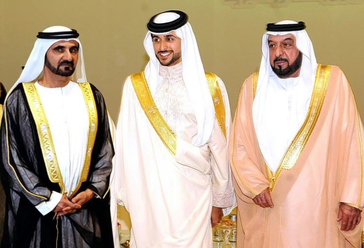 UAE President Sheikh Khalifa bin Zayed Al-Nahyan (R) is seen at the 2009 wedding ceremony of Sheikh Nasser bin Hamad Al-Khalifa (C), son of Bahrain's King Sheikh Hamad, and Dubai's ruler Sheikh Mohammed bin Rashid Al-Maktoum (L)