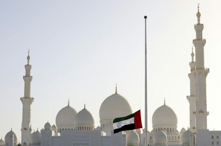 The United Arab Emirates flag flies at half-mast outside the Sheikh Zayed Grand Mosque in Abu Dhabi