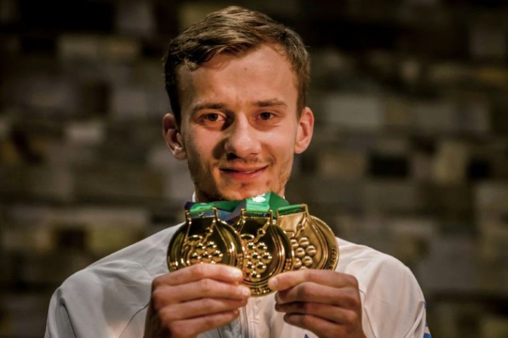 Ukranian orienteering athlete Dmytro Levin said he dedicated his three medals -- two gold and one bronze -- to his home country