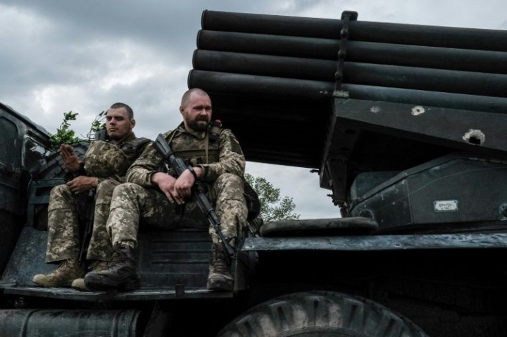 Ukrainian soldiers have been fighting for three weeks to repel Russian advances across a river near the destroyed village