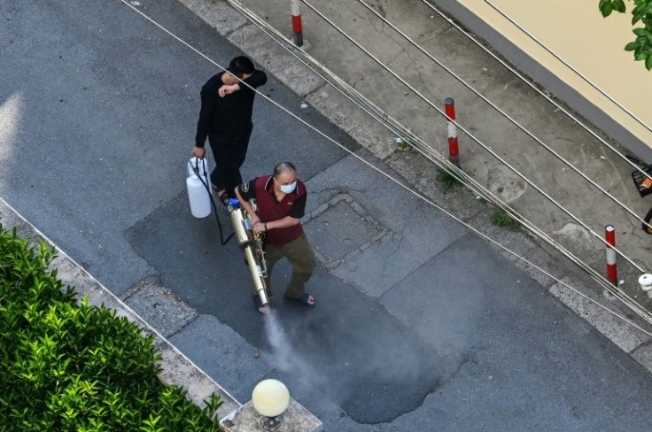 Disinfectant spraying is part of China's fight against Covid but experts say such efforts are largely useless against a virus that is spread by coughs and sneezes