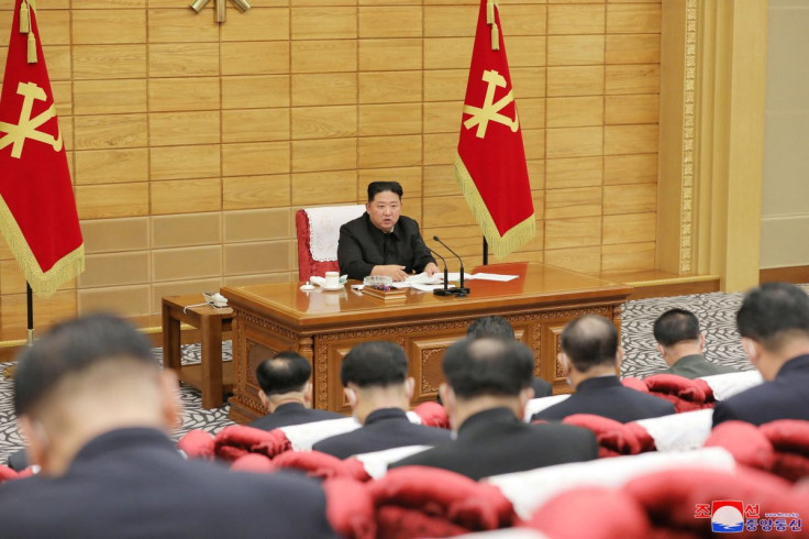 North Korean leader Kim Jong Un speaks at a politburo meeting of the ruling Workers' Party to inspect the country's antivirus efforts against the coronavirus disease (COVID-19) pandemic in this undated photo released by North Korea's Korean Central News A
