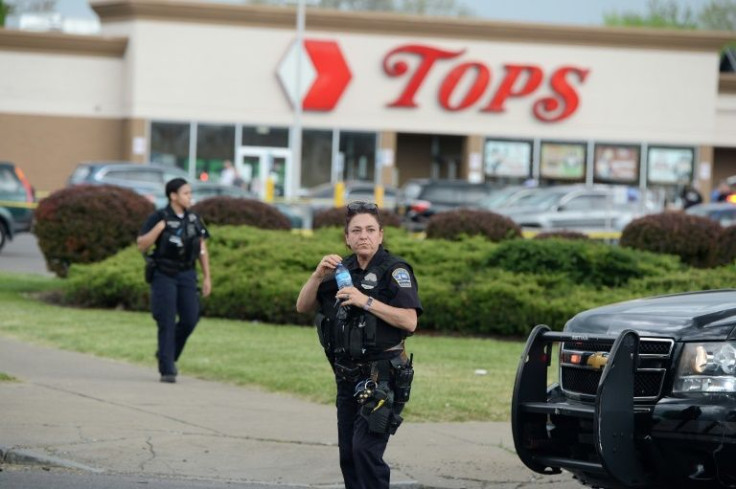 Police at a Tops Friendly Market in Buffalo, New York, where authorities said a gunman killed 10 people on May 14, 2022