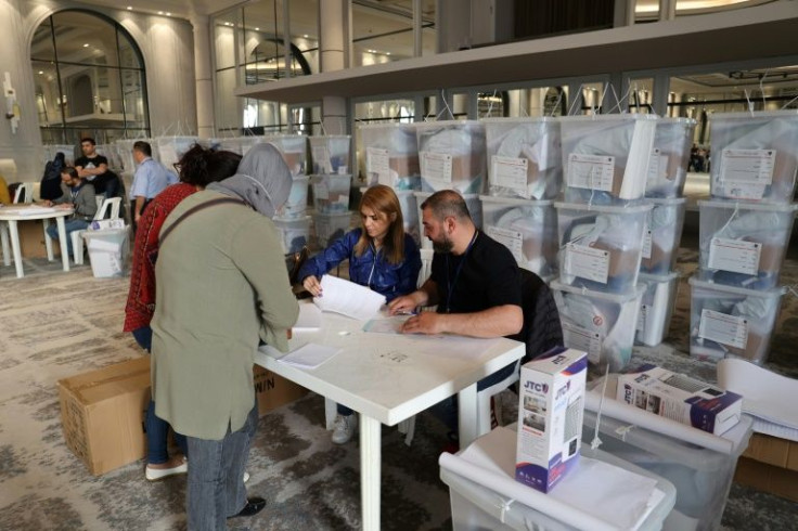 Ballot boxes are distributed to polling station staff ahead of Lebanon's first election since a currency collapse plunged most of its population into poverty
