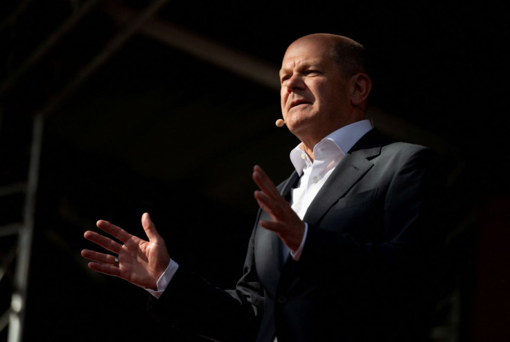 Social Democratic Party (SPD) German Chancellor Olaf Scholz attends an election campaign rally of top candidate for North-Rhine Westphalian federal state election Thomas Kutschaty in Cologne, Germany, May 13, 2022.     