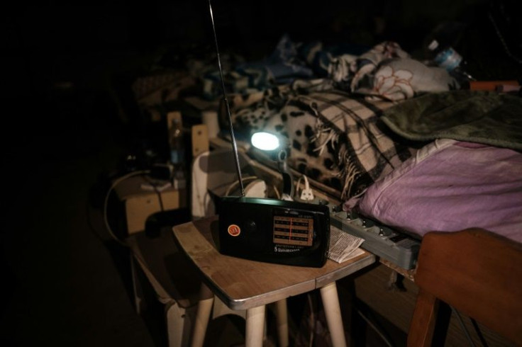 The portable radio in the Lysychansk kindergarten cellar offers its seven residents the only link to the outside world