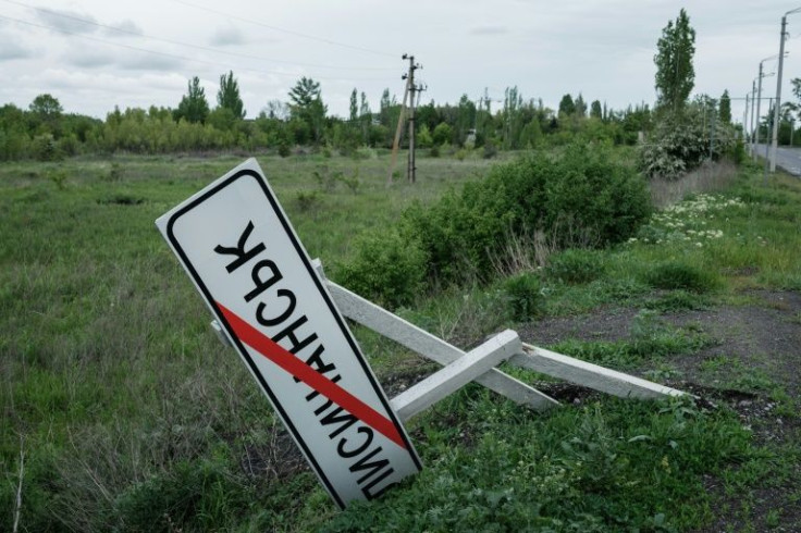 Although technically under Ukrainian control, Lysychansk has turned into a lawless city that is roamed by armed men and shelled throughout the day