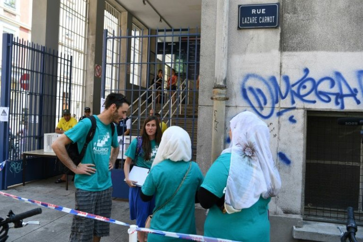 Members of a local campaign group in Grenoble forced their way into a public pool in burkinis in June 2019