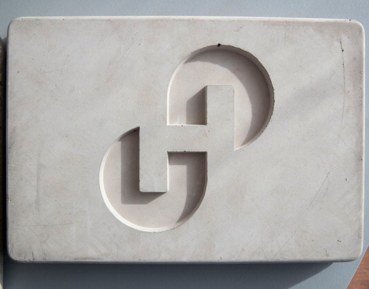 The new logo of Swiss cement maker Holcim is seen in a block of concrete during the Holcim Capital Markets Day event in Basel, Switzerland, November 18, 2021. 