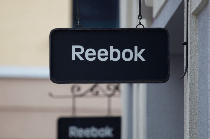 Boards with Reebok store logo are seen on a shopping center at the outlet village Belaya Dacha outside Moscow, Russia, April 23, 2016.
