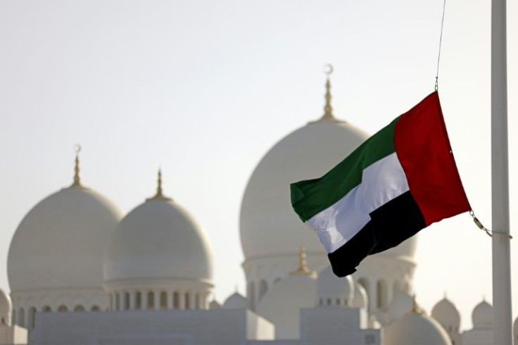 The flag of United Arab Emirates flies at half-mast outside the Sheikh Zayed Grand Mosque in Abu Dhabi on May 13, 2022, following the death of UAE's President Sheikh Khalifa bin Zayed Al-Nahyan