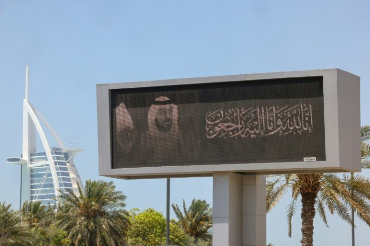 A billboard displays the portrait of late UAE's president Sheikh Khalifa bin Zayed Al-Nahyan in the Emirate of Dubai on May 14, 2022, as the oil-rich Gulf state observes a period of mourning