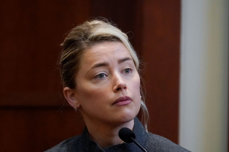 Actor Amber Heard testifies in the courtroom at the Fairfax County Circuit Courthouse in Fairfax, Virginia, U.S., May 16, 2022.  Steve Helber/Pool via REUTERS
