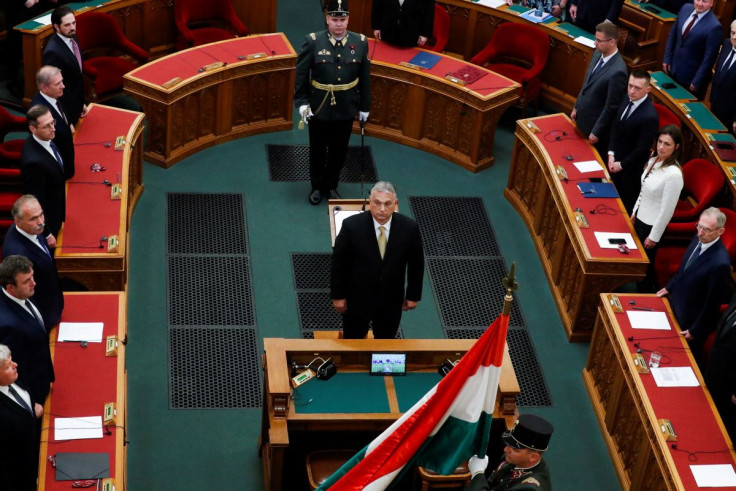 Hungarian Prime Minister Viktor Orban stands before taking the oath of office in the Parliament in Budapest, Hungary, May 16, 2022. 