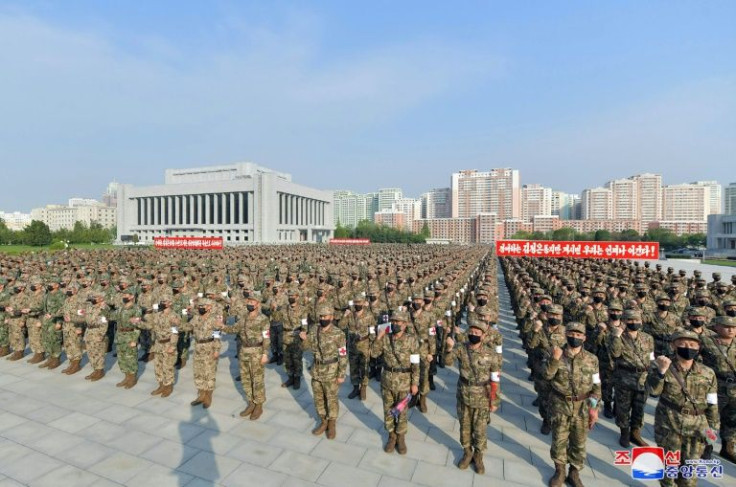 Hundreds of military medical personnel were seen at a rally in Pyongyang in a photo released by the official KCNA news agency