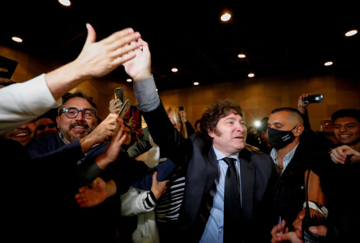 Argentine congressman Javier Milei walks among supporters before the presentation of his book "El Camino del Libertario", at the Buenos Aires International Book Fair in Buenos Aires, Argentina May 14, 2022. 