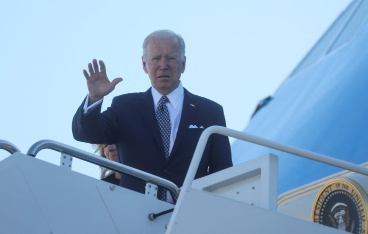 U.S. President Joe Biden waves while boarding Air Force One as he departs Washington on travel to Buffalo, New York in the wake of a weekend shooting at a Buffalo supermarket, at Joint Base Andrews in Maryland, U.S., May 17, 2022. 
