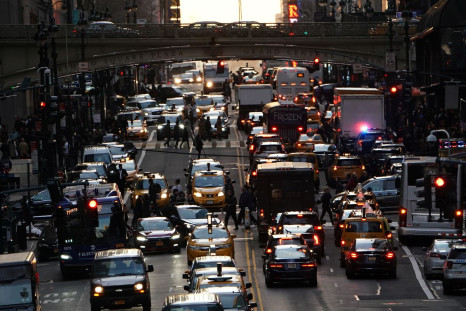 Traffic is pictured at twilight along 42nd St. in the Manhattan borough of New York, U.S., March 27, 2019.   