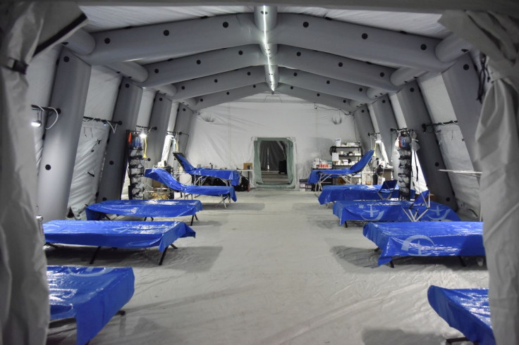 Empty beds are seen at a field hospital deployed by American doctors from the "Samaritan's Purse" organization in an underground parking lot of the King Cross Leopolis shopping mall, amid Russia's invasion of Ukraine, at the village of Sokilnyky, near Lvi