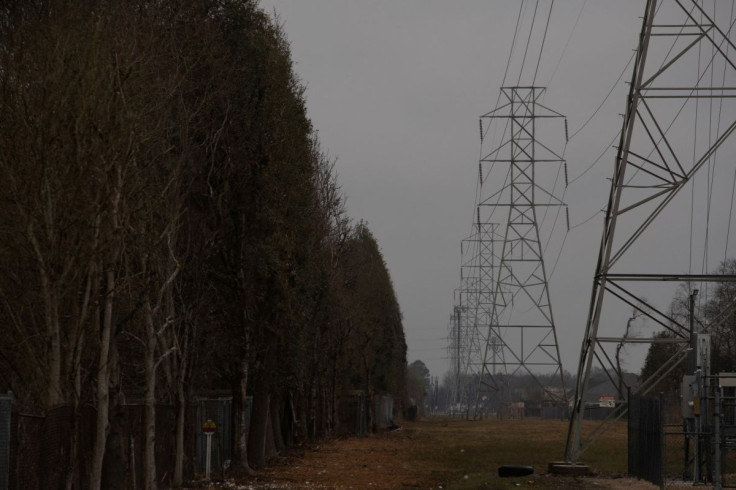 Overhead power lines are seen during record-breaking temperatures in Houston, Texas, U.S., February 17, 2021. 