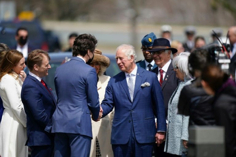 Canada's Prime Minister Justin Trudeau greets Prince Charles and his wife Camilla upon arrival in St. John's, Newfoundland