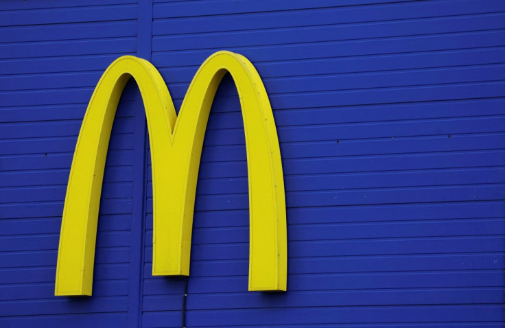 A sign with the logo is on display near a McDonald's restaurant in Moscow, Russia May 16, 2022.