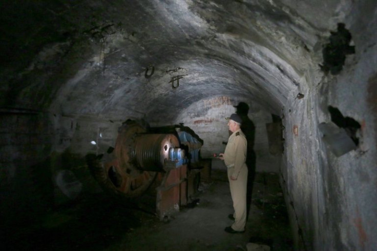 At the abandoned base of Porto Palermo, a vast anti-atomic submarine tunnel, dug into the rock in the late 1960s, was intended for Chinese missile boats that never arrived