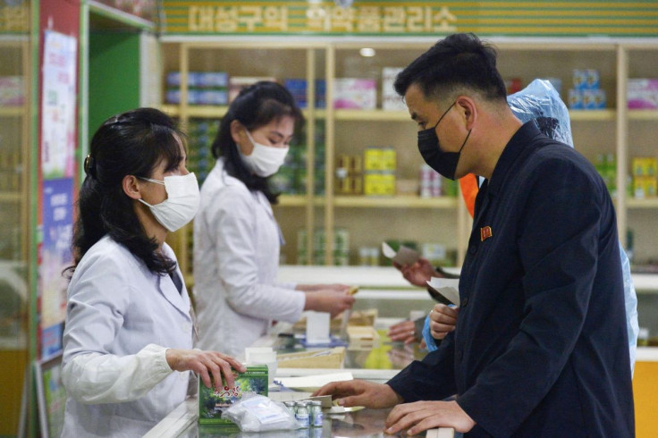 A man visits a pharmacy, amid growing fears over the spread of the coronavirus disease (COVID-19), in Pyongyang, North Korea, in this photo taken on May 16, 2022 and released by Kyodo on May 17, 2022. Kyodo/via 
