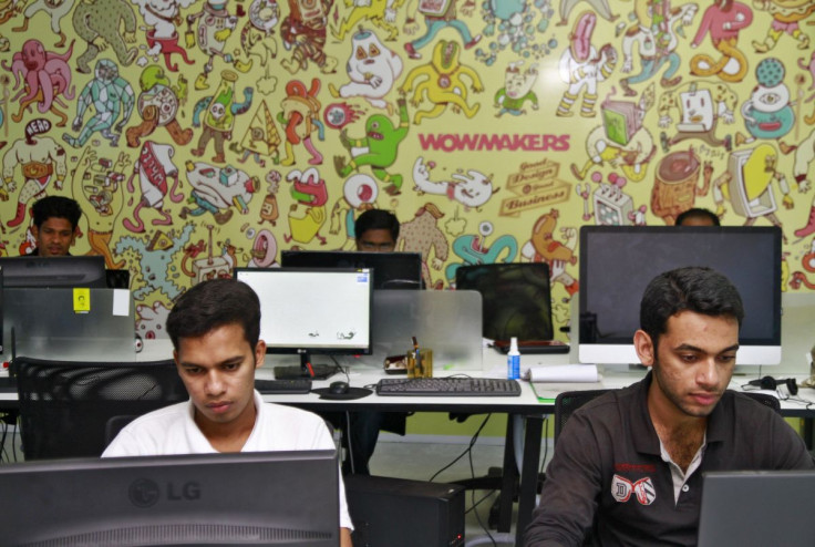 Design artists work on their computer terminals at the Start-up Village in Kinfra High Tech Park in the southern Indian city of Kochi October 13, 2012. 