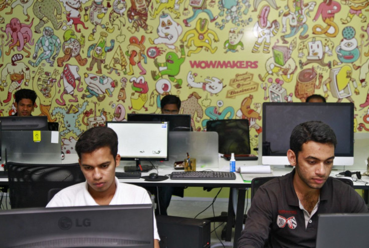 Design artists work on their computer terminals at the Start-up Village in Kinfra High Tech Park in the southern Indian city of Kochi October 13, 2012.