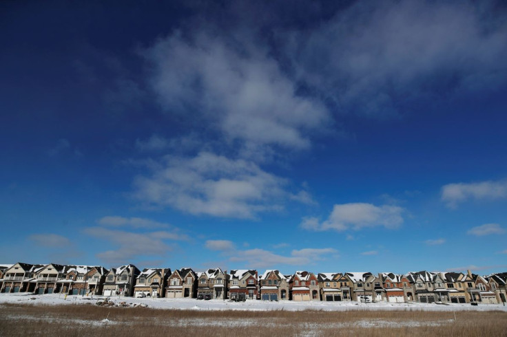 A row of houses stand in a newly built subdivision in East Gwillimbury, Ontario, Canada, January 30, 2018. 