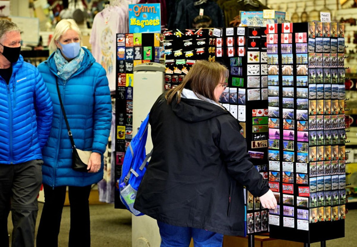 Tourists shop for souvenirs in Gastown as the pace of cruise ships arriving in Canadian ports picks up, two years after the industry was shuttered due to the COVID-19 pandemic, in Vancouver, British Columbia, Canada May 13, 2022.  