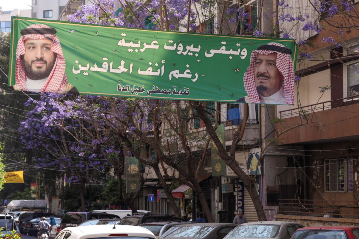 A view shows a banner depicting Saudi Crown Prince Mohammed bin Salman and Saudi King Salman bin Abdulaziz in Beirut, Lebanon May 18, 2022. The banner reads "Beirut remains Arab despite hateful meddling".