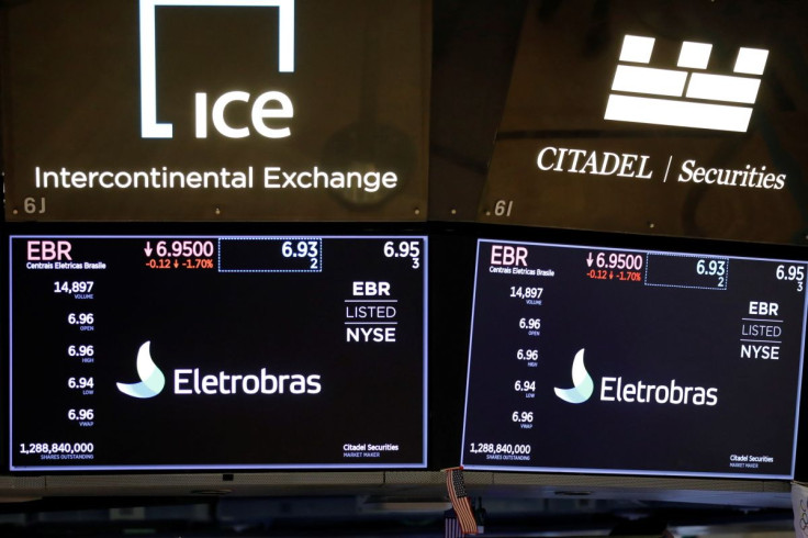 Logos of Eletrobras, a hydroelectric power generation company based in Brazil, is seen on the floor at the New York Stock Exchange (NYSE) in Manhattan, New York City, U.S., August 20, 2021.
