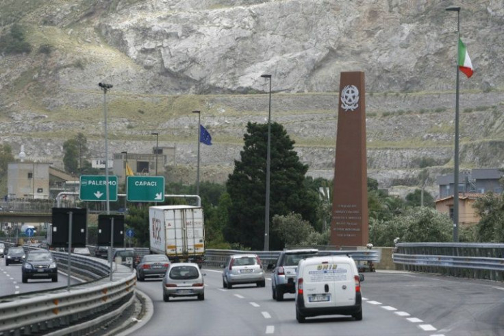 A tall red monument stands at the site of the car bomb attack which killed anti-mafia judge Giovanni Falcone in Palermo in May 1992