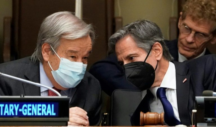 UN Secretary-General Antonio Guterres (L) and United States Secretary of State Antony Blinken (R) speak during a "Global Food Security Call to Action" meeting of foreign ministers at the United Nations