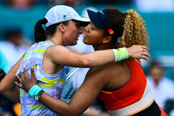 Naomi Osaka reached her first final in 13 months at the Miami Open, losing to world number one Iga Swiatek (L)