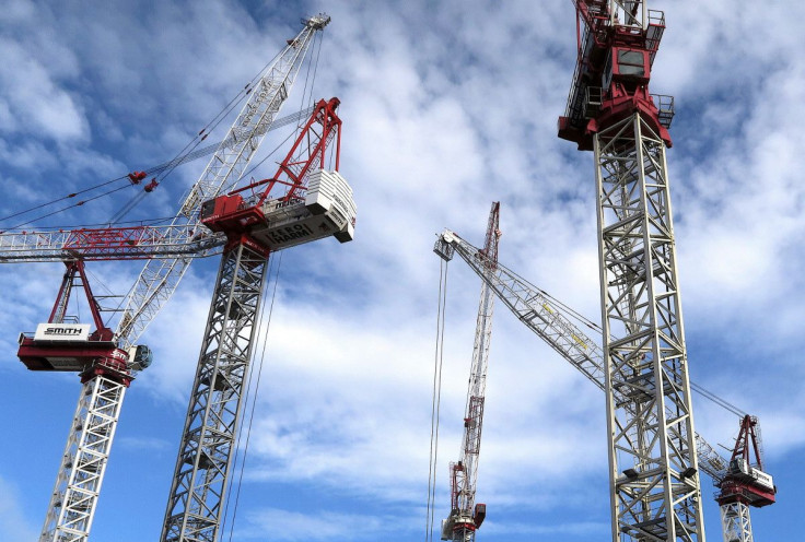 FILE PHOTO - Cranes located on construction sites are seen in central Auckland, New Zealand, June 25, 2017. 